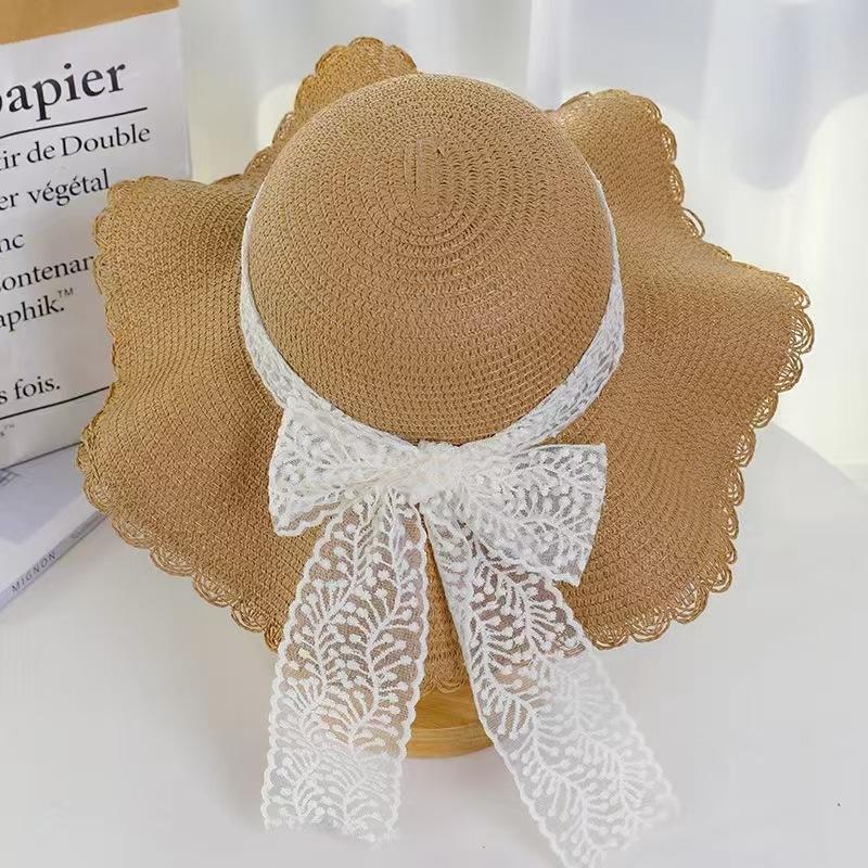 Sweet bow embroidered straw hat women's seaside vacation fisherman's hat children's summer hollow breathable straw visor
