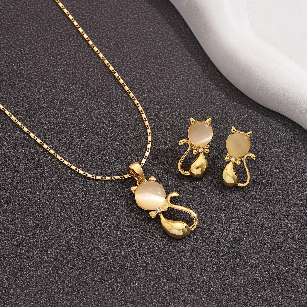 

Инкрустированное ожерелье Цепочка змейка Женские серьги Клетчатые серьги с драгоценными камнями Золотые серьги Котенок, капающее масло