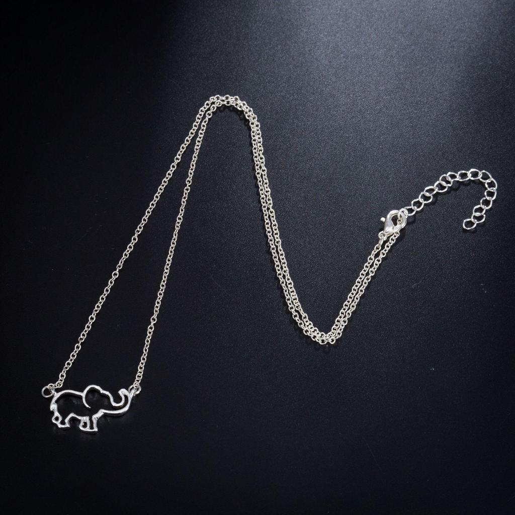Elegant Elephant Pendant Necklace: Cute Hollow Design for Women