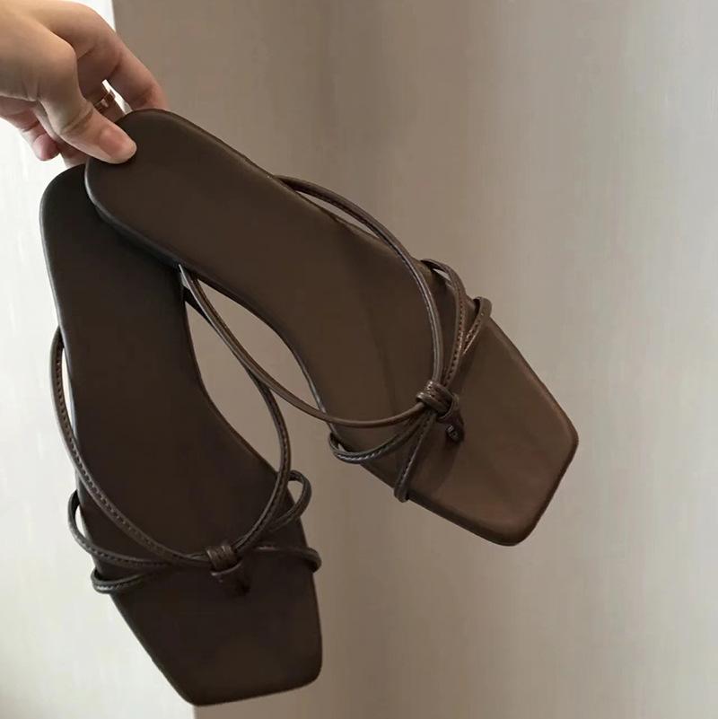 

In the summer of 2025, the new French square head with thin straps, hollowed out pinch feet, thick heel flat bottom cool slippers, women s thick hee 40