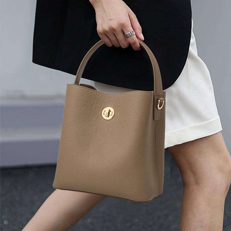 Elegant retro hand-carried water bucket top layer cowhide multi-layered shoulder strap lock tote bag single shoulder cross-body