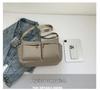 Unisex vodoodpudivá nylonová crossbody taška s více kapsami