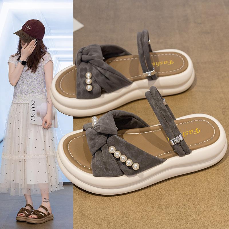 Thick-bottomed cool slippers female 2025 summer new fairy wind outside wear Internet celebrity versatile pearl bow word slippers