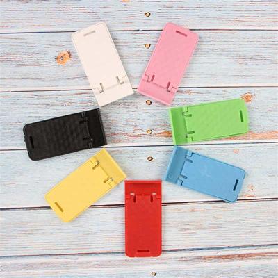 Support de téléphone en plastique réglable à plusieurs vitesses et à double ouverture
