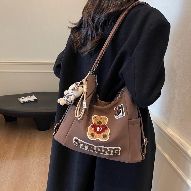 

Tote bag women s 2025 new large-capacity commuter backpack women s multi-purpose shoulder messenger bag premium backpack 33*13*23 темно-коричневого кольору