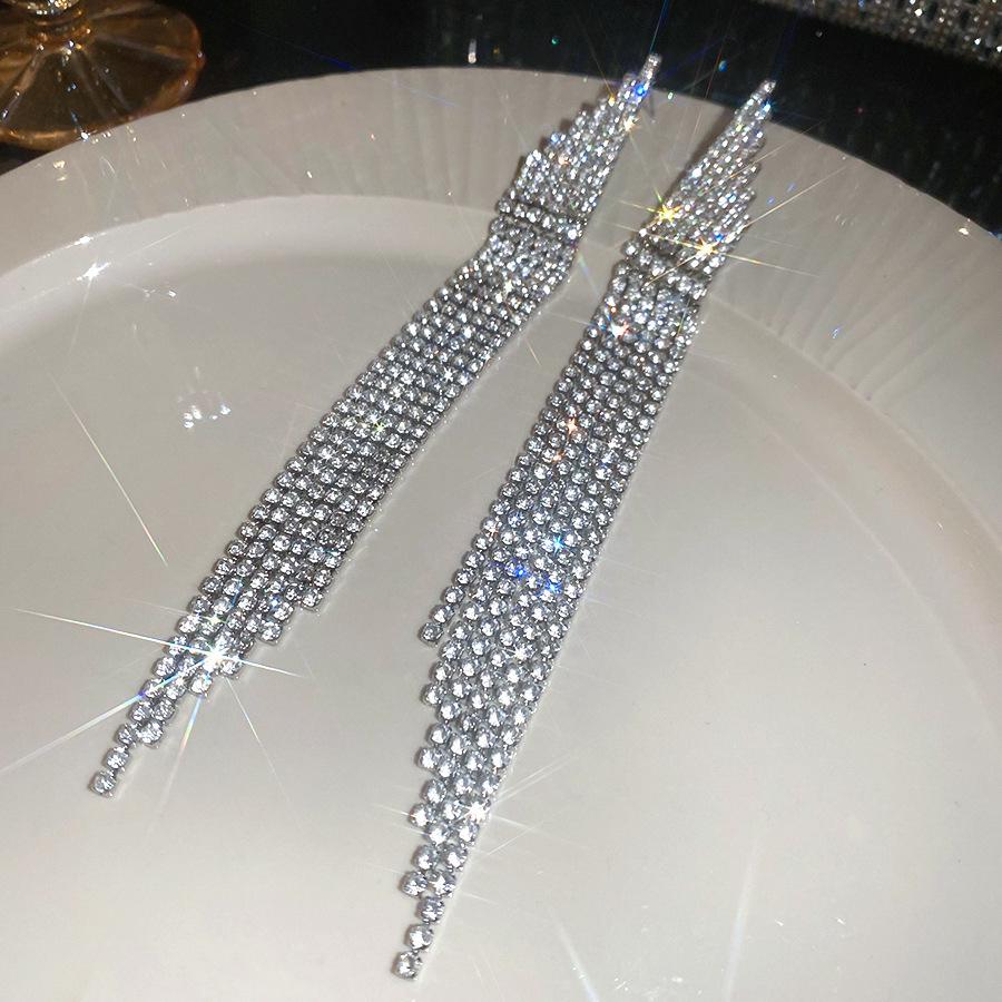 Silver Needle Rhinestone Tassel Earrings: Luxurious, Elegant & Bold Ear Studs with a Fashionable, Irregular Design