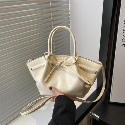 Koreanische Nischen-Tragetasche für Gemüse, Damen, Frühling und Sommer 2025, neue trendige Mode-Eimertasche, Umhängetasche mit Schleife