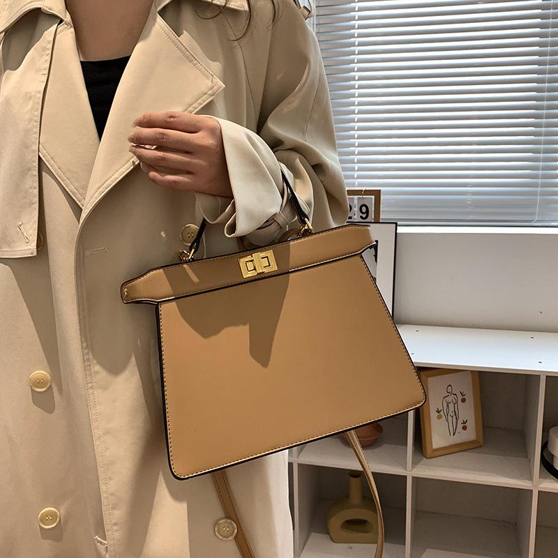 New High-end Solid Color Lock Kaibaoli Portable Shoulder Oblique Span Women's Bag