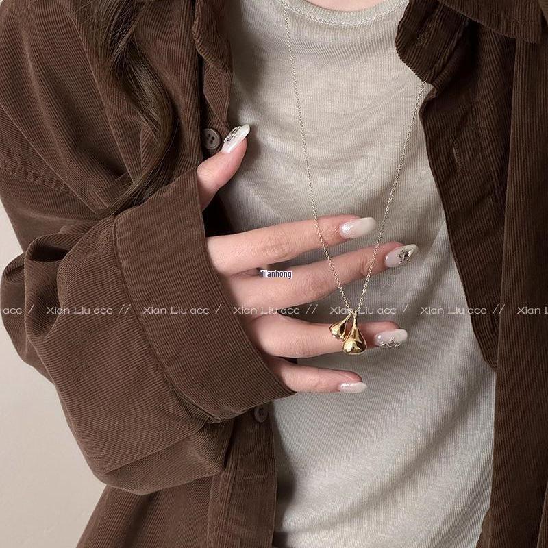 2025 Gold Water Drop Pendant Necklace: Elegant Long Chain for Women