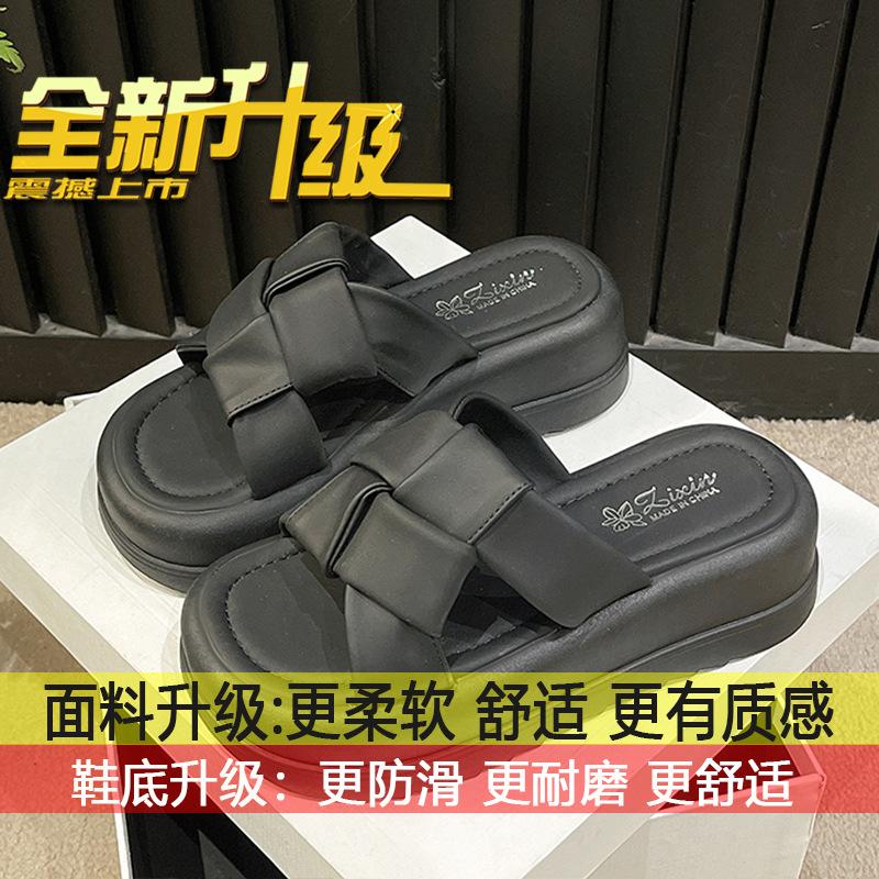 French high-end fashion beach one-word sandals for women's summer wear 2025 new black thick-soled heightening slippers