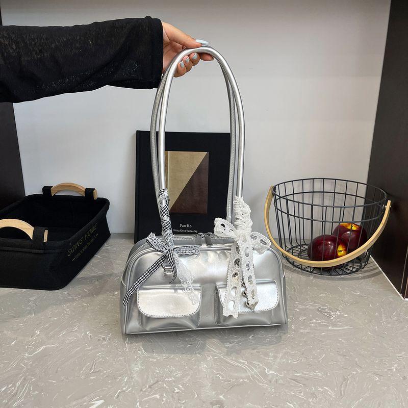 

Silver Bowling Underarm Bag Women s 2025 New Arrival Summer Light Luxury Minority Fancy Shoulder Boston Bag Silver + pendant and ribbon