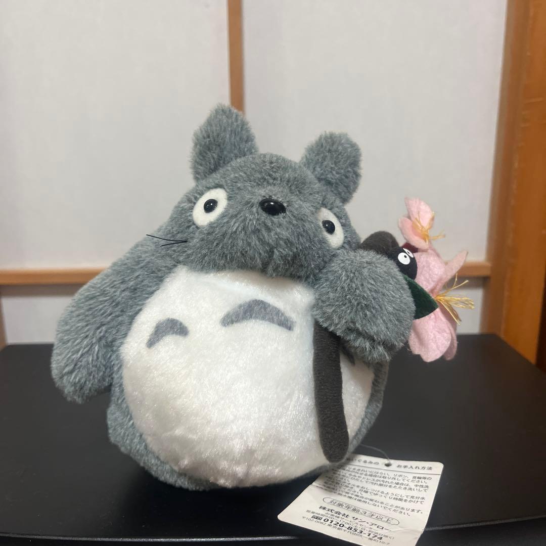 Totoro stuffed toy with flowers