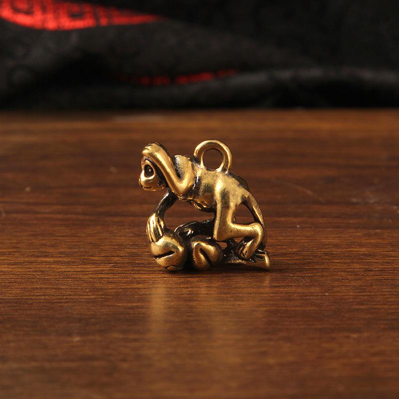

Antiqued Brass Zodiac Monkey Keychain Pendant - Attracts Wealth & Fortune with Peach Offering Design