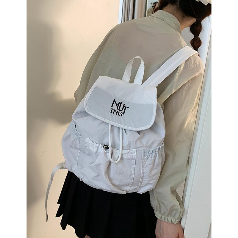 Casual nylon canvas backpack bag women s 2025 new fashion letter backpack college wind large capacity schoolbag