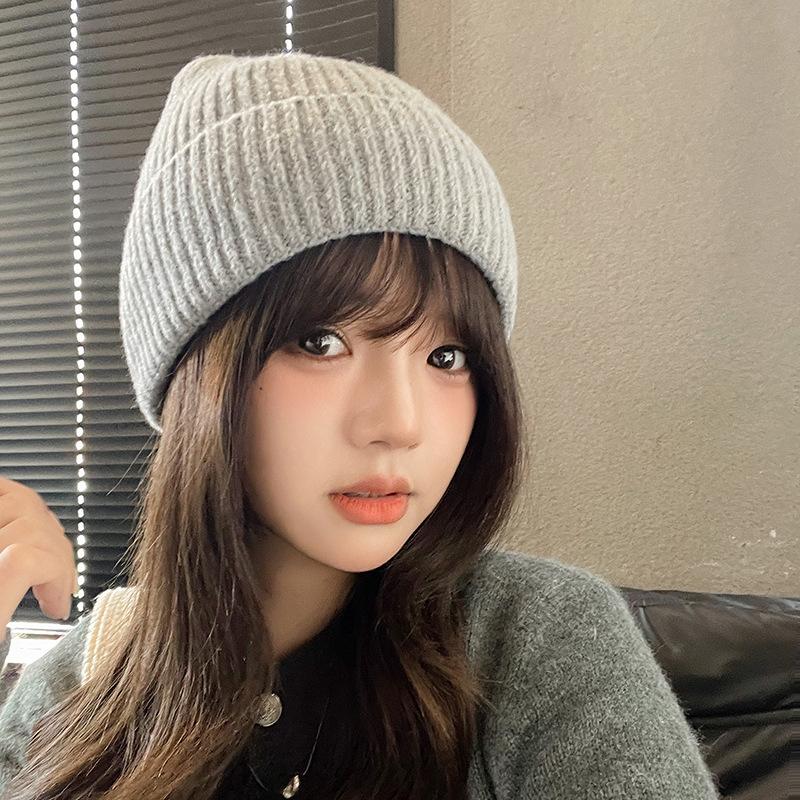 Jesienno-zimowa wersja koreańska wszechstronnej czapki otulającej głowę, damska puszysta ciepła czapka chroniąca uszy, czapka typu beanie, dziergana czapka z grubej wełny