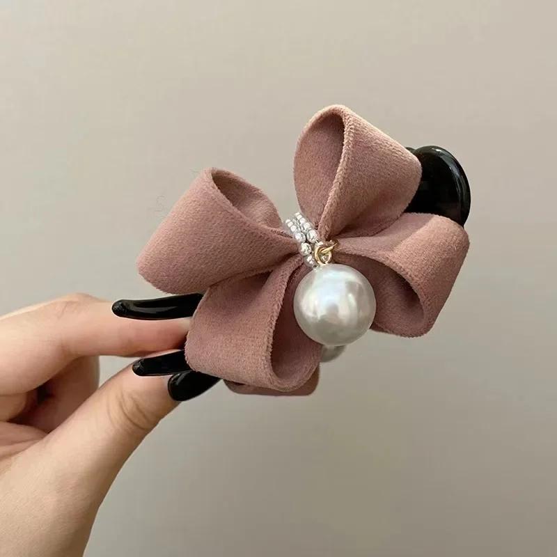 

Large-sized hairpin with a bowknot, elegant and high-end hair accessory for women, clip on the back of the head розовый