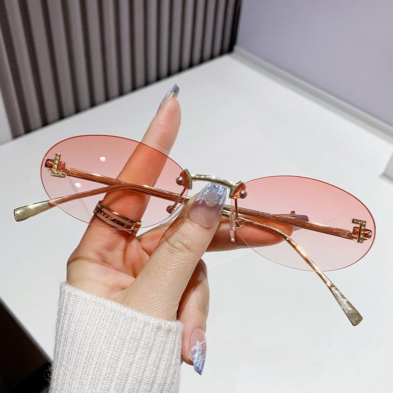 

Fashion Retro Oval Rimless Sunglasses for Women Elegant Diamond Oval Sunglasses Male Letter F Rimless Sunglasses Female