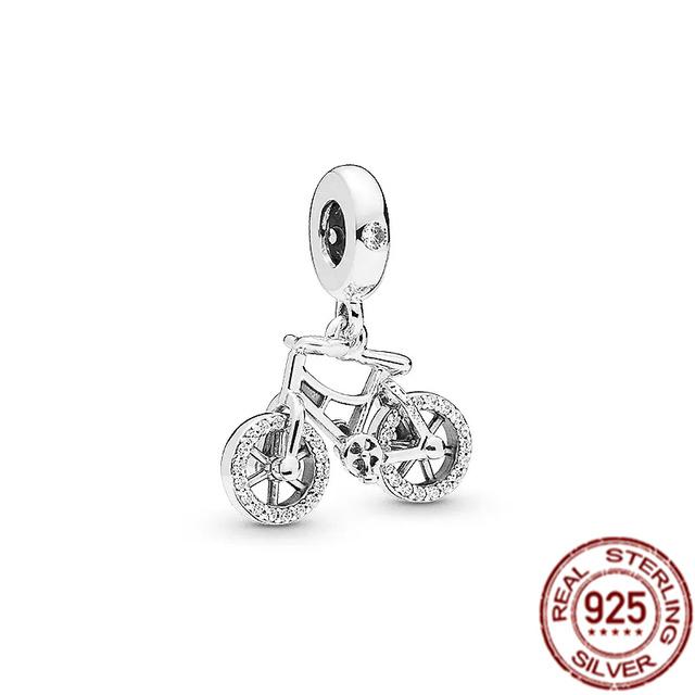 

Срібло 925 проби із замикаючими сердечками та вітрильним човном. Висячі шарм-намистини підходять для оригінального модного браслета, намиста, ювелірного подарунка своїми руками