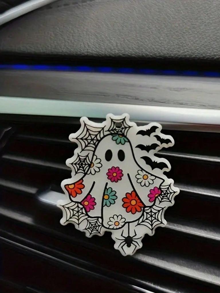 The 2D Acrylic Ghost Car Air Vent Fragrance Clip adds a festive atmosphere and a touch of cuteness to the car interior.