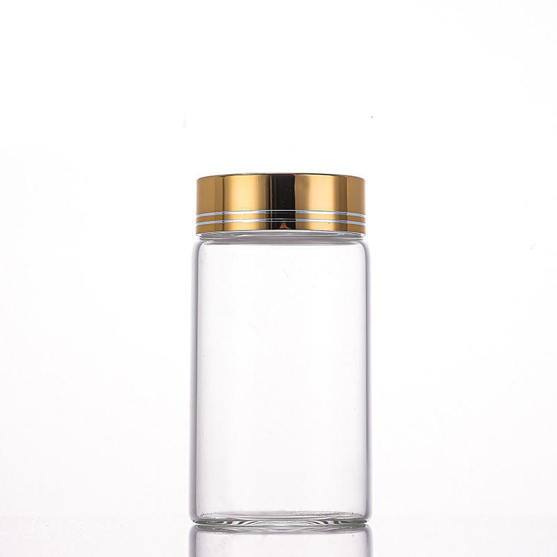 65mm Thickened High-Transparency Glass Bottle with Gold Oxidized Aluminum Screw Cap for Cereal and Grain Packaging.