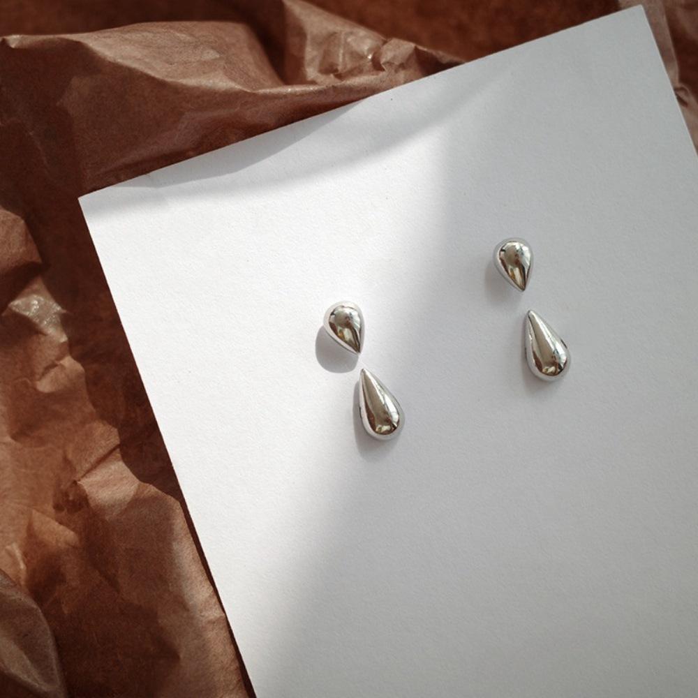 Korean version of two glossy water drop stud earrings S925 silver needle simple and versatile cold wind earrings earrings tide
