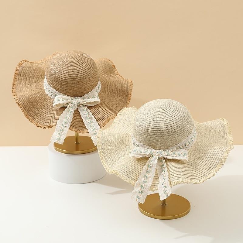 Women's French-Style Lace Bowknot Sunhat with Wavy Brim Foldable Beach Hat for Seaside Travel Spring And Summer