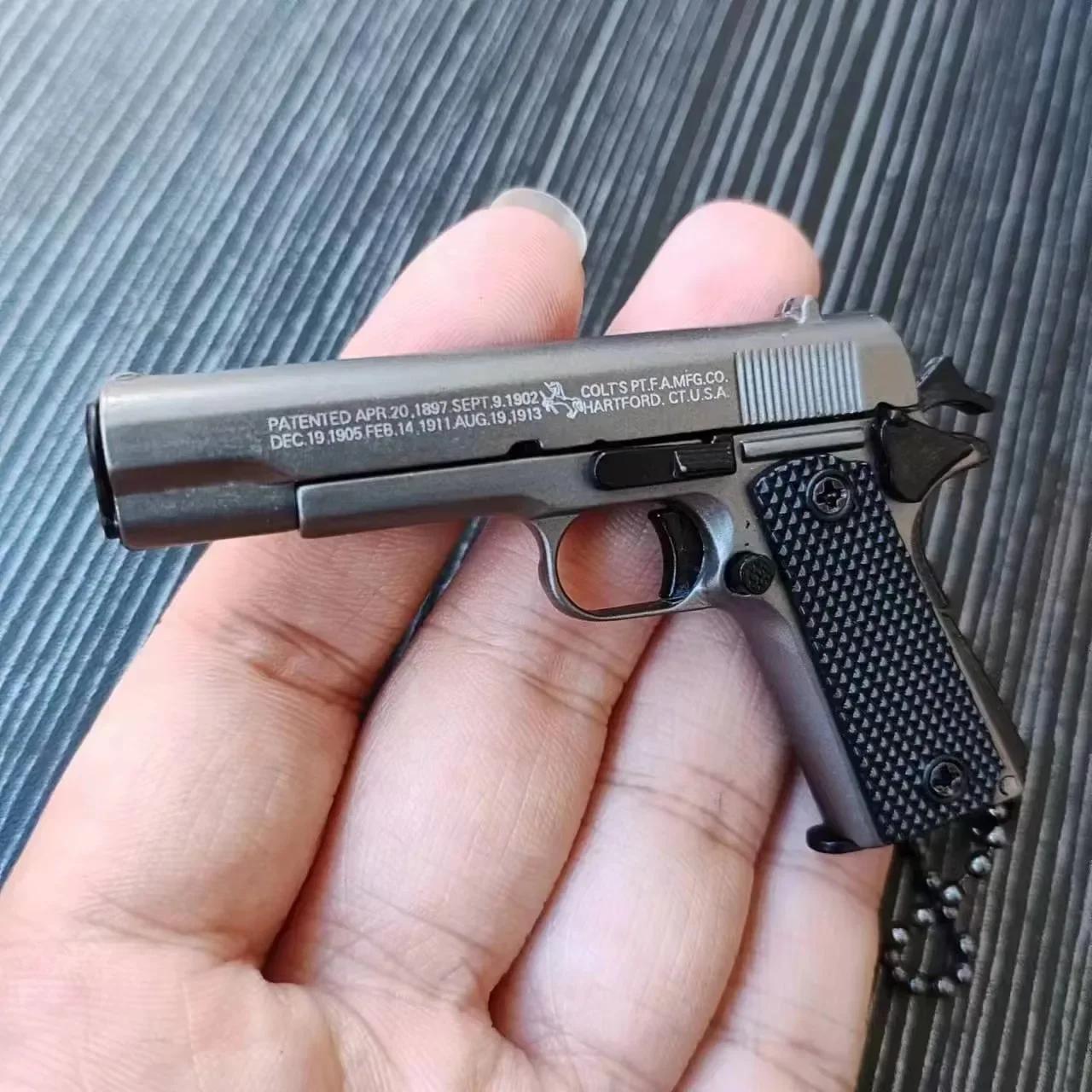 

Сплав 1:3 Мини-модели пистолета 1911 Игрушечный пистолет Съемный брелок-подвеска Украшение Праздничная вечеринка Подарок Взрослым Детям Рождественский подарок