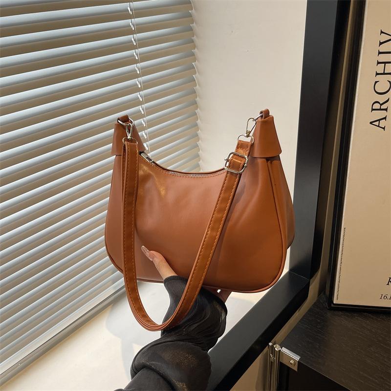 Niche retro texture underarm bag women's new fashionable versatile soft leather commuter single shoulder crossbody dumpling bag
