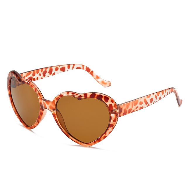 Peach heart Sunglasses love Sunglasses European and American trend frameless conjoined Sunglasses dazzling color glasses