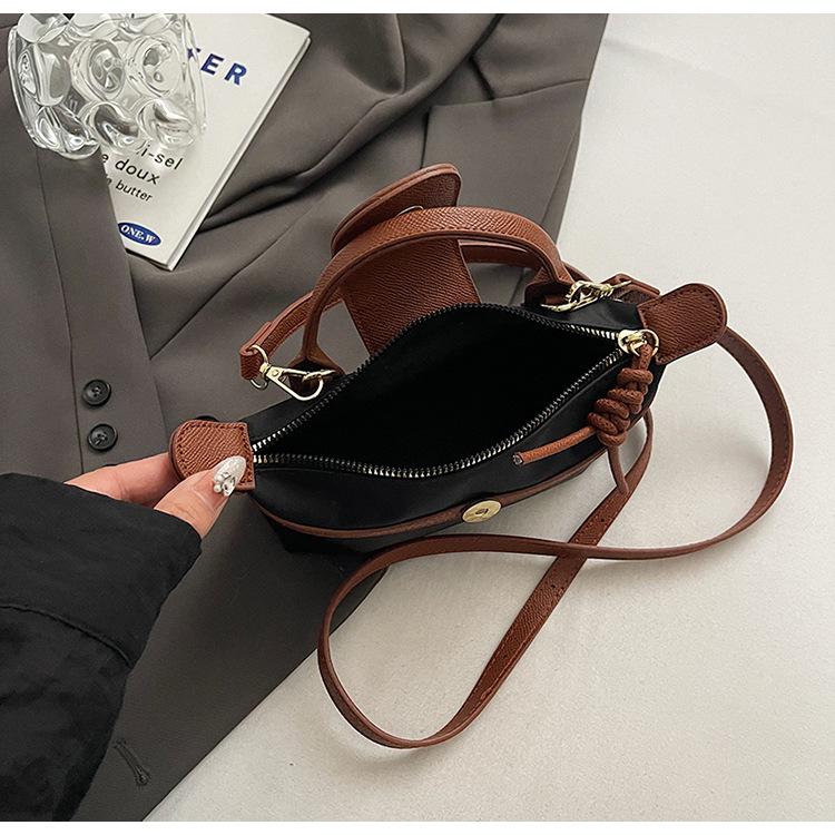 2025 spring new portable casual versatile shoulder messenger Longxiang bag change solid color outdoor bag