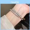 Bracciale di lusso a forma di serpente in rame placcato oro con accenti di zirconi per fashioniste
