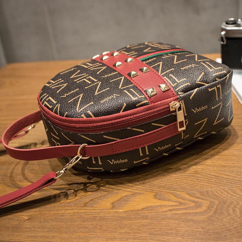 Guangzhou women's bag autumn new product printing fashion rivet bag diagonal span backpack crossbody backpack