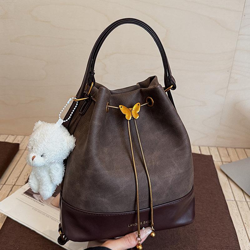 Bucket bag One shoulder messenger bag Women's autumn new niche women's bag Drawstring dual-purpose small backpack