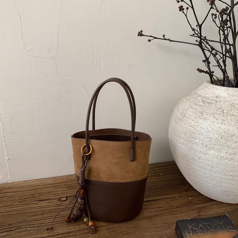 2025 new small bag women's messenger bag retro splicing handbag matte texture bucket bag shoulder bag
