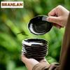 2 Stück/Los Schwarz Gold Keramik Untersetzer Kreativer Ständer Für Tassen Für Kaffeetassen Untertasse Wärmeisolierung Tischsets Teetasse Basis Teegeschirr