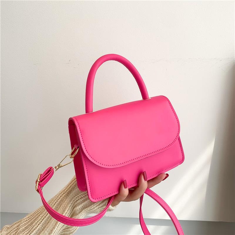 

Маленька сумочка з однотонною текстурою, жіноча сумка в іноземному стилі, популярна нова корейська версія модної універсальної сумочки через плече рожевий