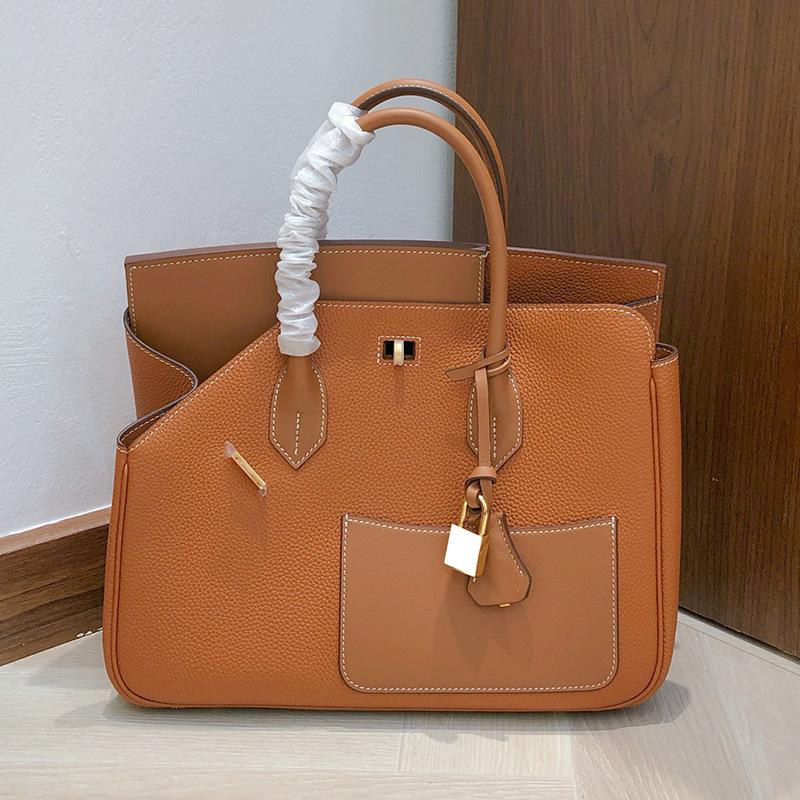 

Высококачественная сумка из коровьей кожи высшего слоя платиновой отделки с лоскутным контрастом цветов из кожи неправильной формы, женская сумка, сумка-тоут, карманная сумка большой вместимости 30x12x25cm коричневый