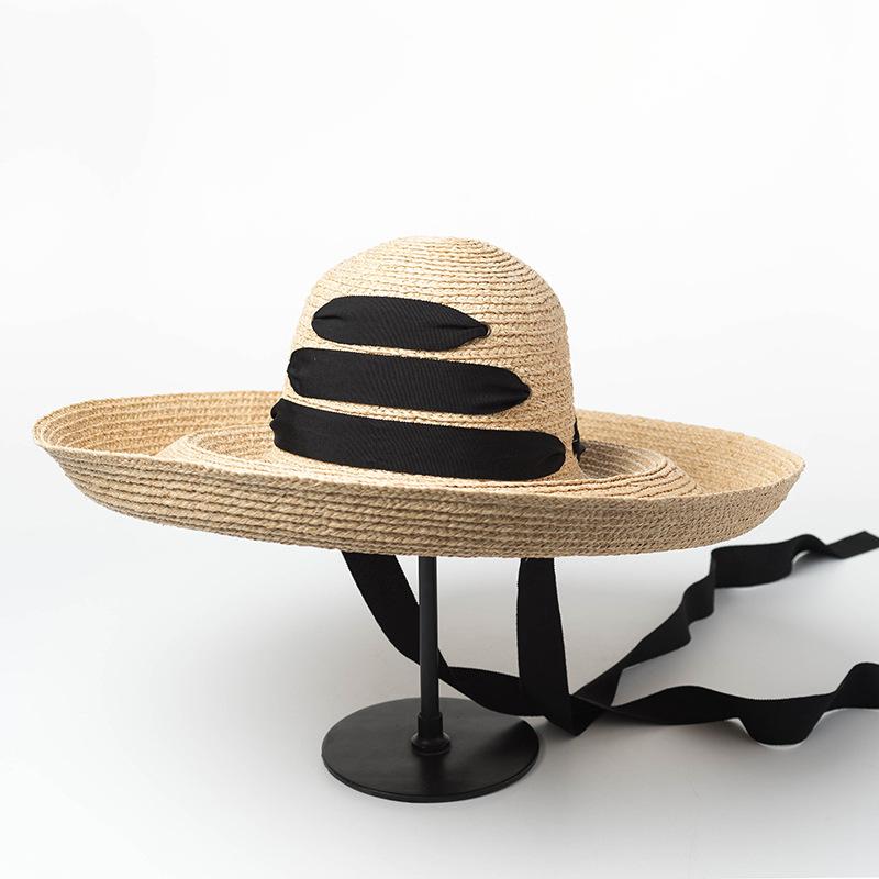 European and American fashion retro dome hemming strap big eaves Lafite straw hat outdoor shading catwalk big edge beach straw hat