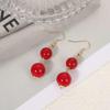 Elegant Retro Red Chinese Festive Earrings: High-End, Simple, Ancient-Style Ear Pendants with a Unique Design.