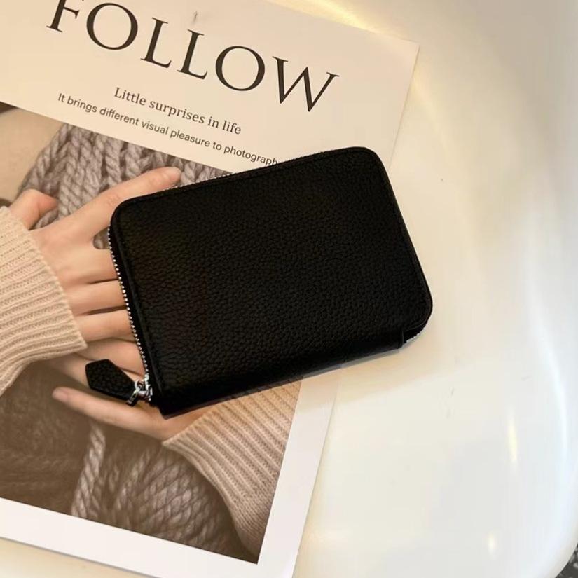 Nouveau petit sac à fermeture éclair en cuir de vachette première couche printemps 2026, portefeuille en cuir véritable, porte-monnaie en cuir souple, production et vente en gros par fabricant de Guangzhou