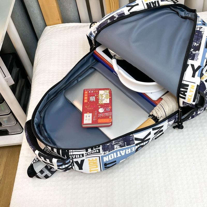 Schoolbag trendy cool graffiti boys junior high school students Internet celebrity schoolbag men large capacity fashion casual versatile backpack