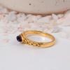 Vintage Gold Amethyst Marquise Ring: Delicate purple navette gemstone and ornate filigree band, perfect for stacking.