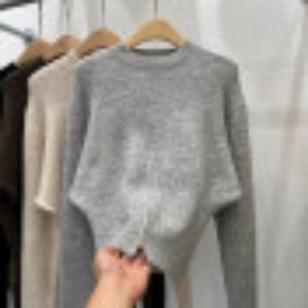 A New Design of A Stylish Round-neck Sweater for Women In Early Autumn, with A Semi-zipper Hem and A Cinched Waist
