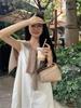 Women's Stylish V-Neck Sleeveless Summer Dress: Loose Fit, Slimming, Solid Color, Short Skirt - New Fashion Collection.