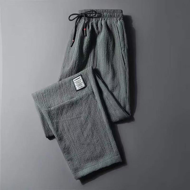 

Spring and Summer Pants Men s Thin Ice Silk Men s Casual Pants Slim Korean Version Spring and Autumn Loose Straight Sports Pants 5XL