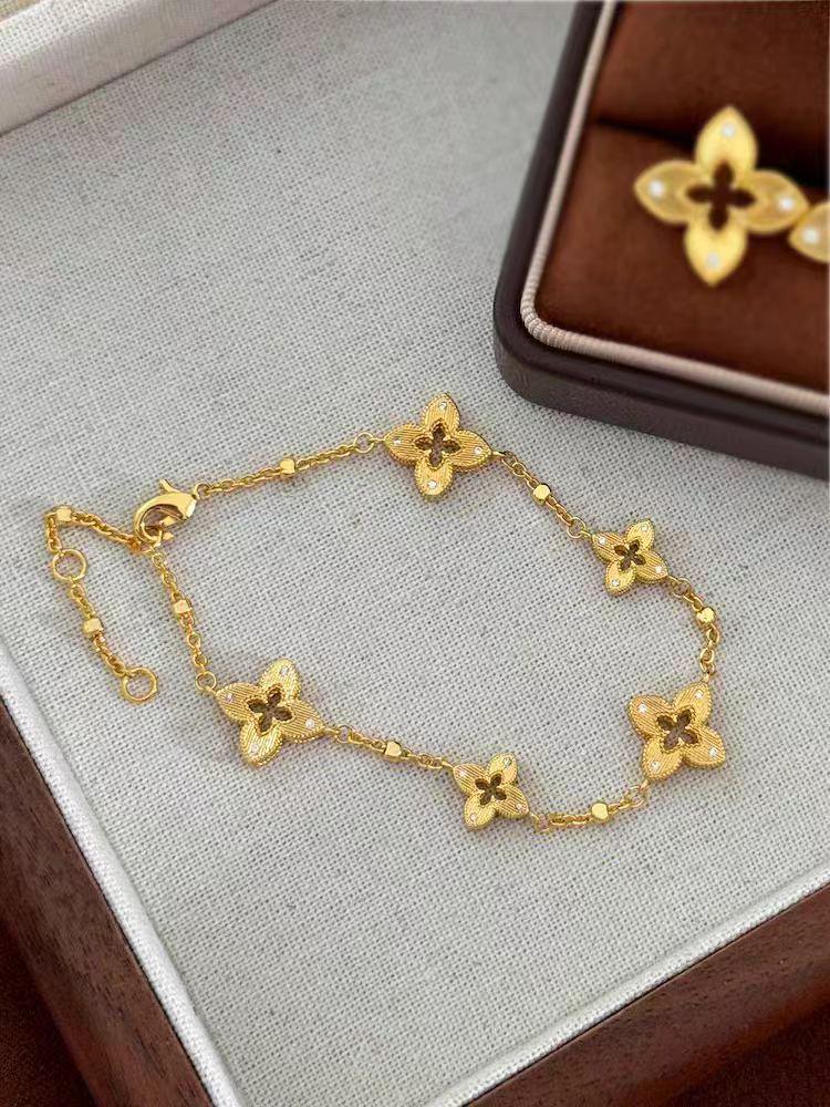 TikTok-Style Four-Leaf Clover Diamond Bracelet: Women's Luxurious Gold-Tone Titanium Steel Jewelry