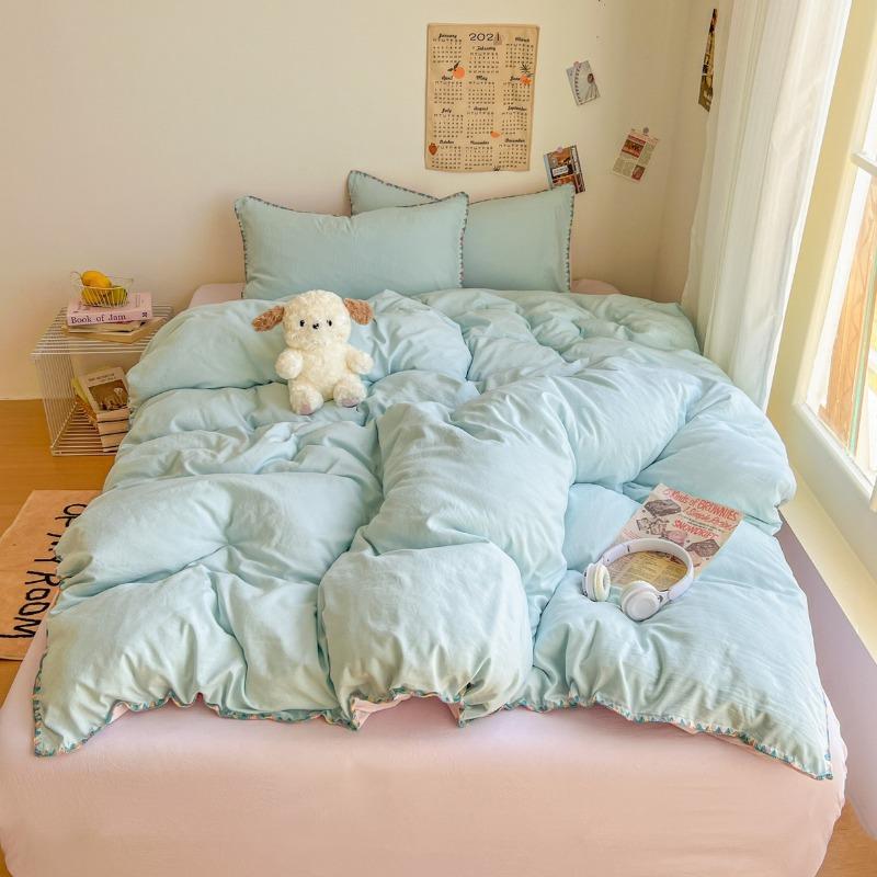 Literie Class A 2025 nouveau vent crème couleur unie drap de lit ensemble quatre pièces housse de couette étudiante ensemble quatre pièces ménage