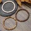 Handgefertigte Geometrische Kokosnussschalen-Perlenarmbänder für Männer und Frauen mit mehrlagigem Design