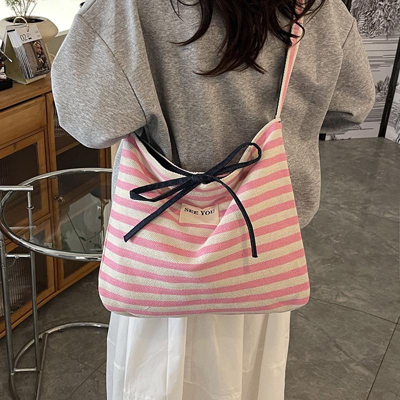 Casual large-capacity striped bag women's new summer commuter versatile messenger bag shoulder tote bag