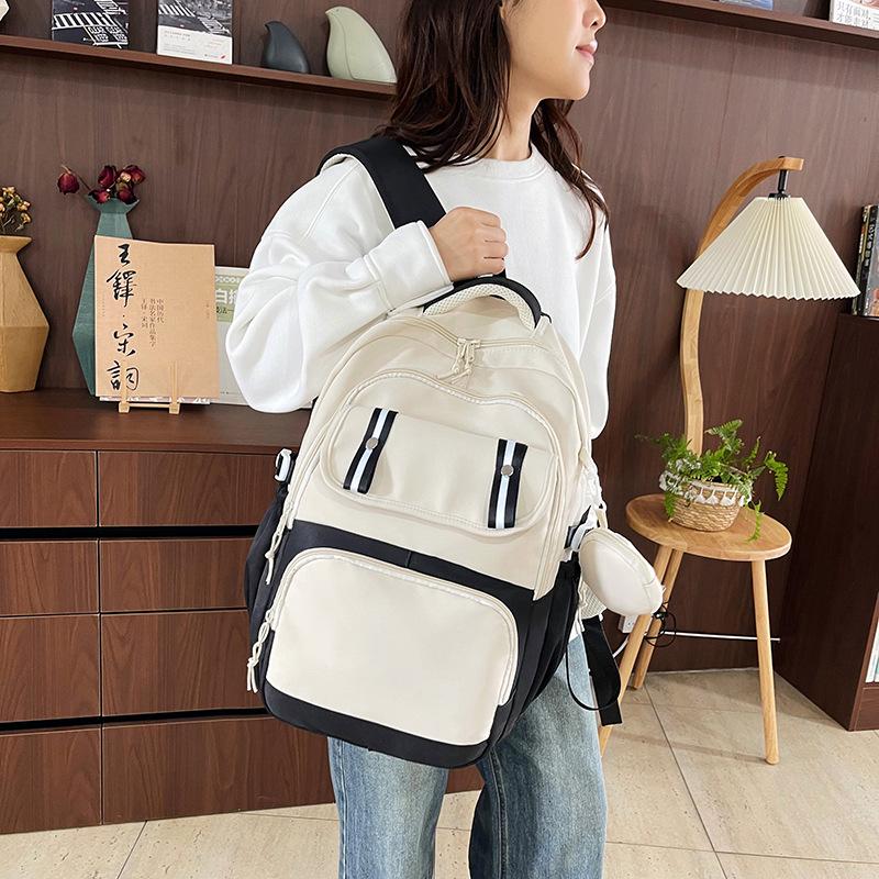 Schoolbag1011 winter new high value fashion light simple student bag tide Korean version large capacity travel backpack